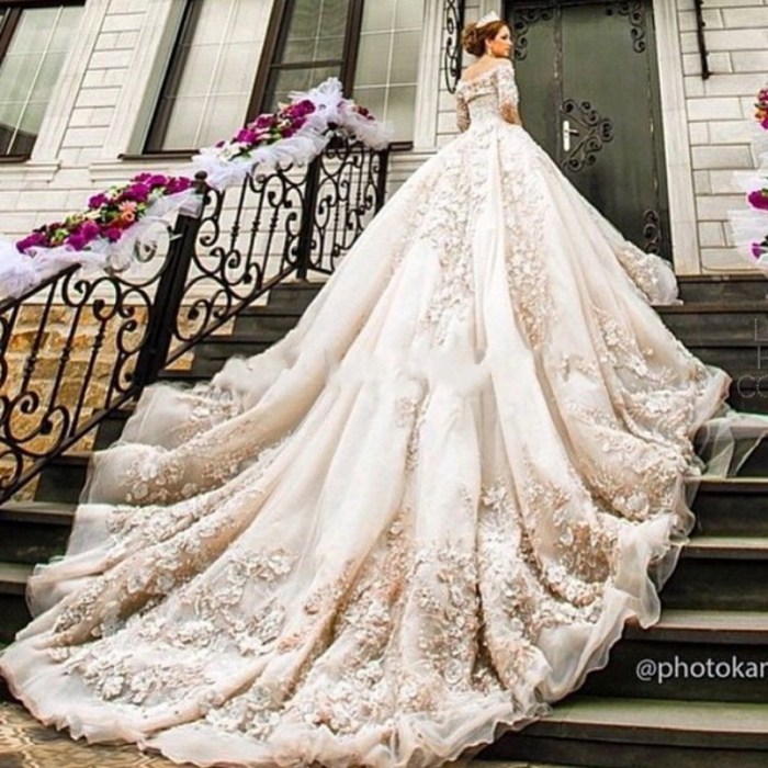 Lace wedding dress with long train